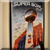 C09. Authographed Superbowl XLVI poster. 